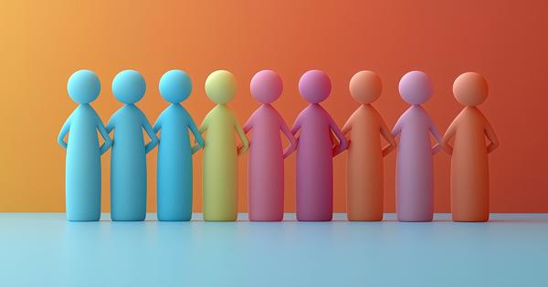 A row of eight abstract, colourful human figures standing side by side against a warm gradient background, symbolizing unity and diversity.
