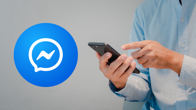 Person in a light blue shirt using a smartphone next to a large Facebook Messenger logo.