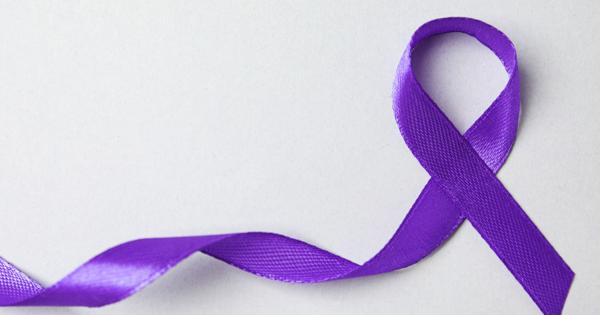 Purple awareness ribbon on a light background, symbolising support for domestic abuse survivors and raising awareness of domestic violence.