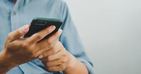 Person using a smartphone, representing how residents can report anti-social behaviour online quickly and easily.