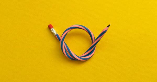 Twisted pencil with alternating blue and pink stripes, red eraser, and metallic ferrule, forming a loop with the sharpened tip pointing outward. Set against a solid yellow background.