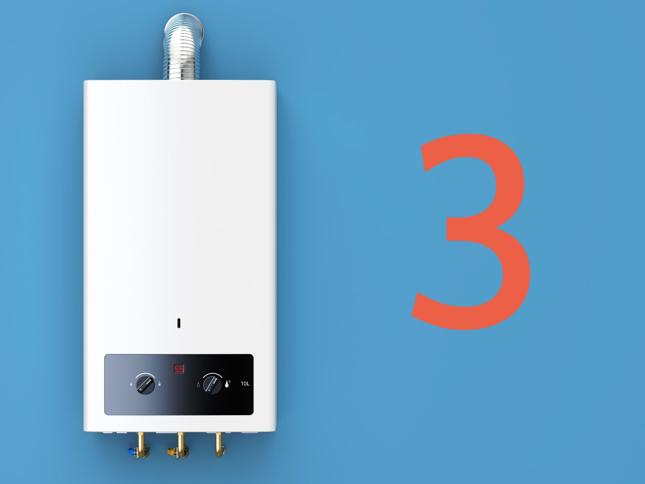 "White tankless water heater mounted on a blue wall, displaying '55' in red digital text, with two control knobs on the front panel and a vent pipe at the top. A large number '3' is visible to the right "White tankless water heater mounted on a blue wall, displaying '55' in red digital text, with two control knobs on the front panel and a vent pipe at the top. A large number '3' is visible to the right