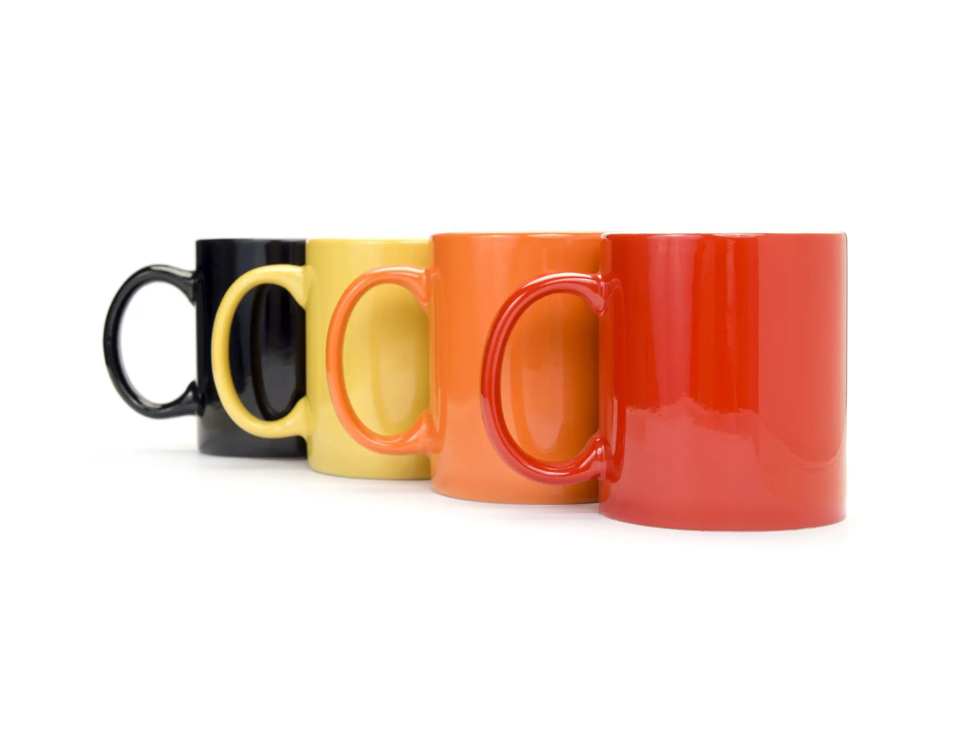 Four colourful mugs lined up in a row, symbolising informal, welcoming community safety drop-in sessions where residents can speak to staff over a cuppa.