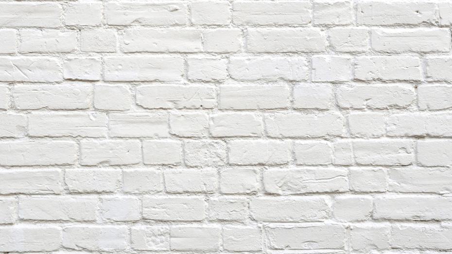 White painted exterior wall. White painted exterior wall.